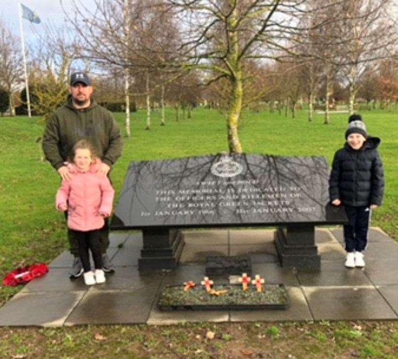 Lance Shingler with his children at the memorial to his former regiment, The Royal Green Jackets, at the National Memorial Arboretum in Alrewas, Staffordshire (Family handout/PA)