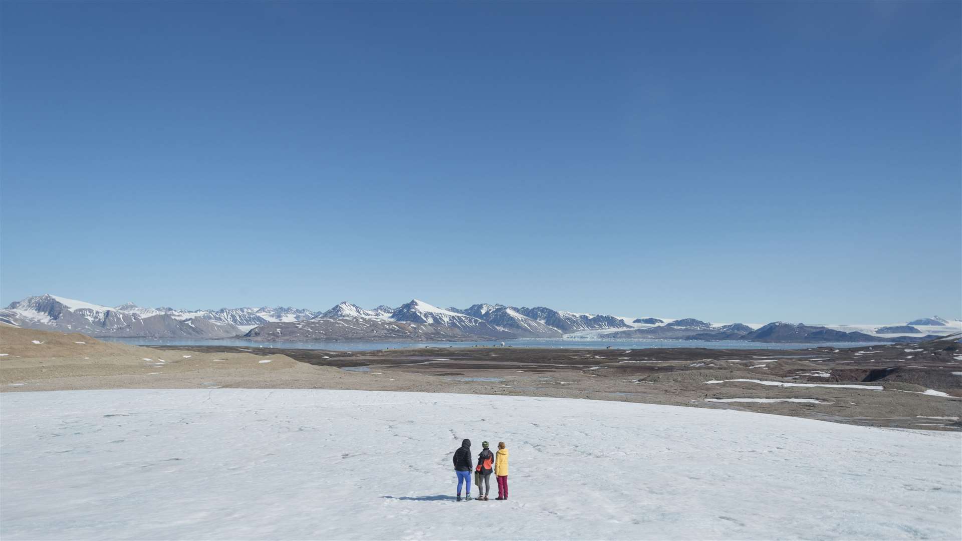 Emily with fellow members of the MicroLab team in Ny Alesund in Svalbard, a Norwegian archipelago in the Arctic Ocean (Iain Rudkin/University of Bristol/PA)