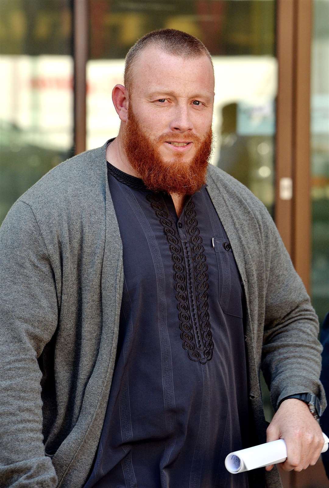 Ibrahim Anderson leaves Westminster Magistrates’ Court in 2015, having pleaded not guilty to terror offences after handing out leaflets about Islamic State in London’s West End (John Stillwell/PA)