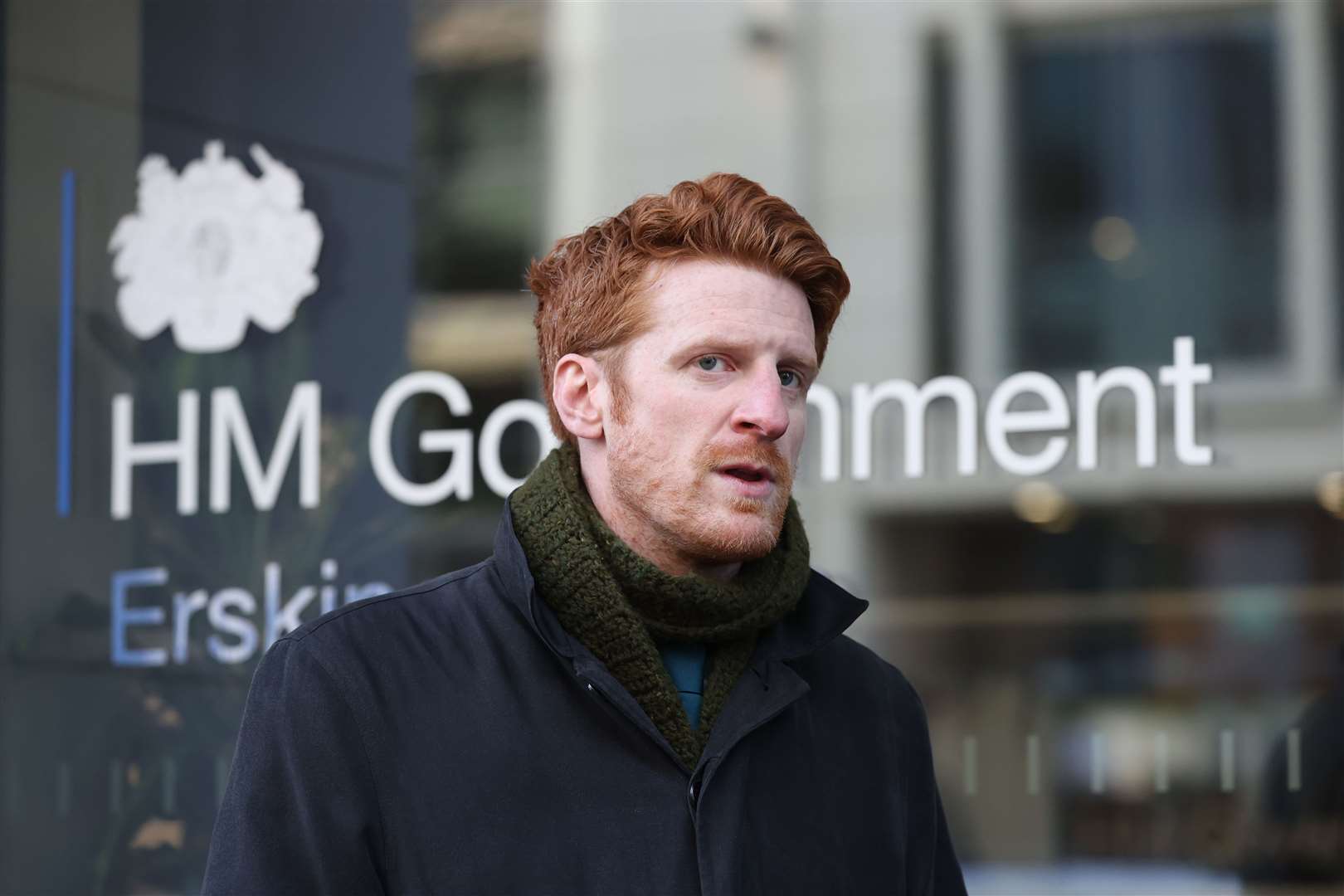 SDLP MLA Matthew O’Toole, speaking to the media outside Erskine House, Belfast (Liam McBurney/PA)