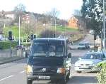 The police and the funeral van at the scene