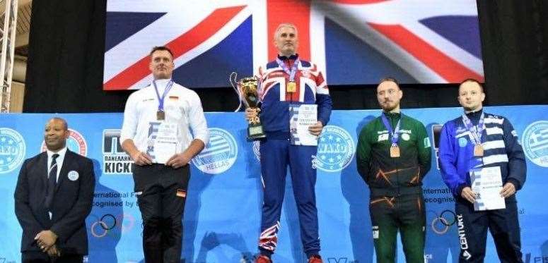 Hildenborough's Alex Chalke with his trophy after success at the 2024 European Kickboxing Championships in Greece. Picture: WAKO