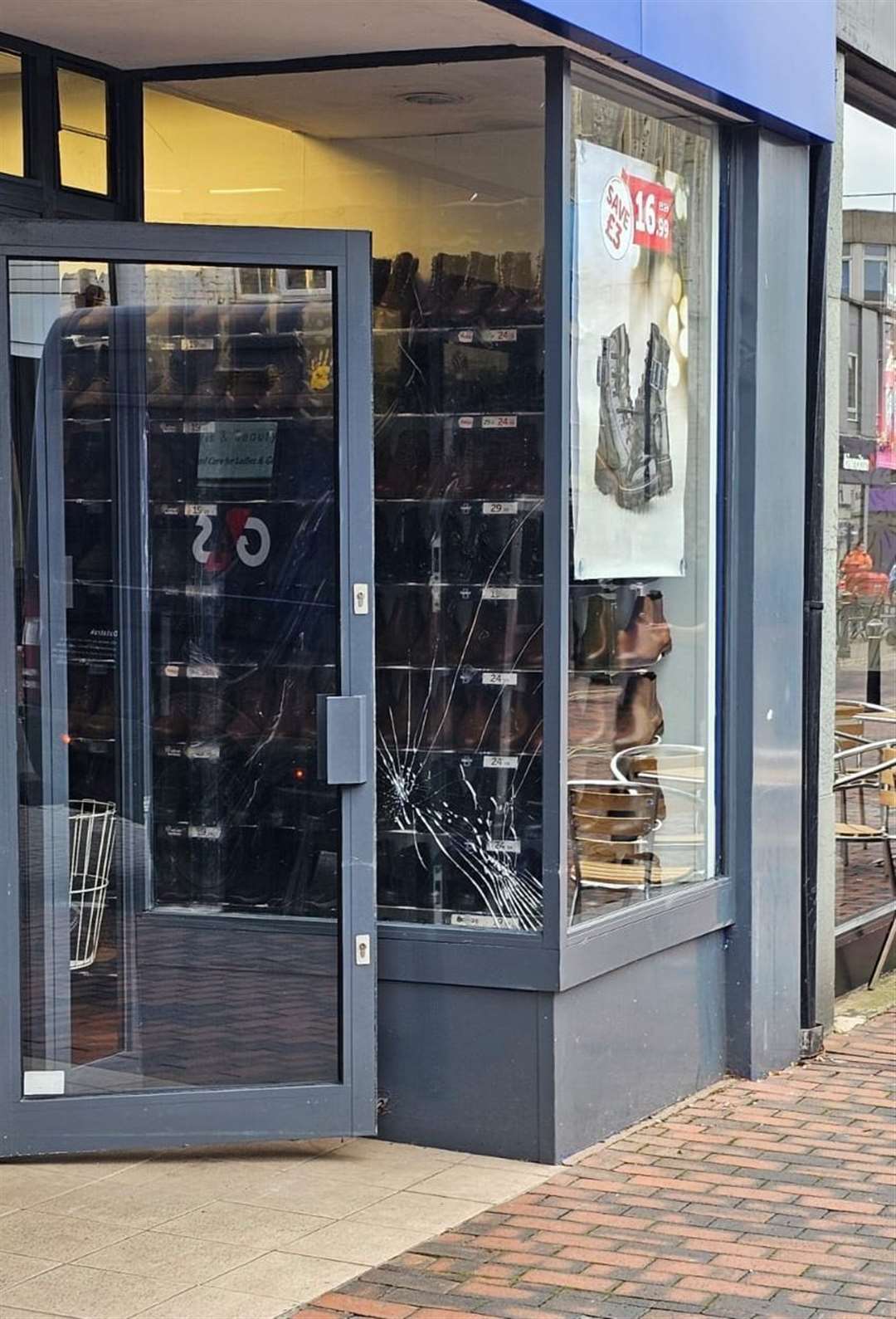 Damage caused to a window at Shoezone in Sittingbourne High Street