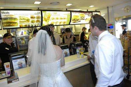 Bride Annie Terry and groom Mark have their wedding party at McDonalds, Orbital Park