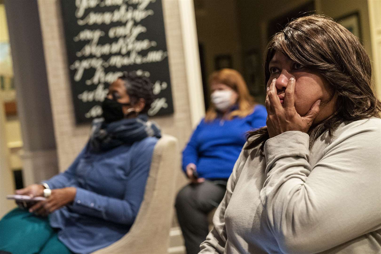 Rita Brown, a supporter of Democratic presidential candidate former vice president Joe Biden, watches election results (David Goldman/AP)