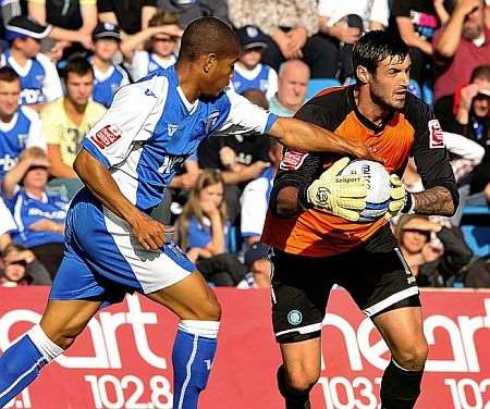 Simeon Jackson puts pressure on Wycombe keeper Scott Shearer. Picture: Barry Goodwin