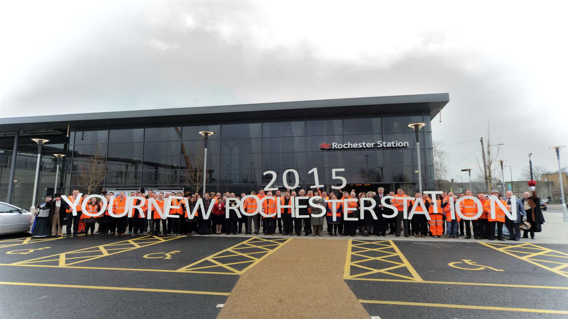 Rail minister Claire Perry, MP Kelly Tolhurst, station staff and visitors celebrate the opening of the new building.