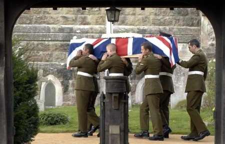 Cpl Violino's coffin was carried into the church on the shoulders of his colleagues. Picture: GRANT FALVEY