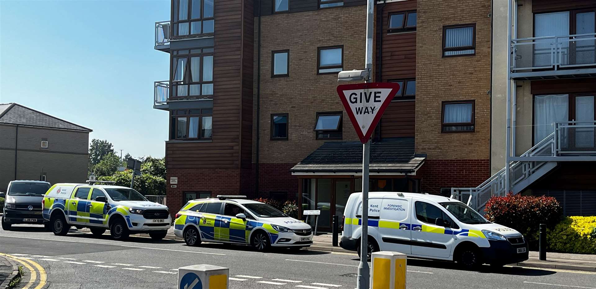 Forensics and police cars outside an address in North Star Boulevard, Greenhithe