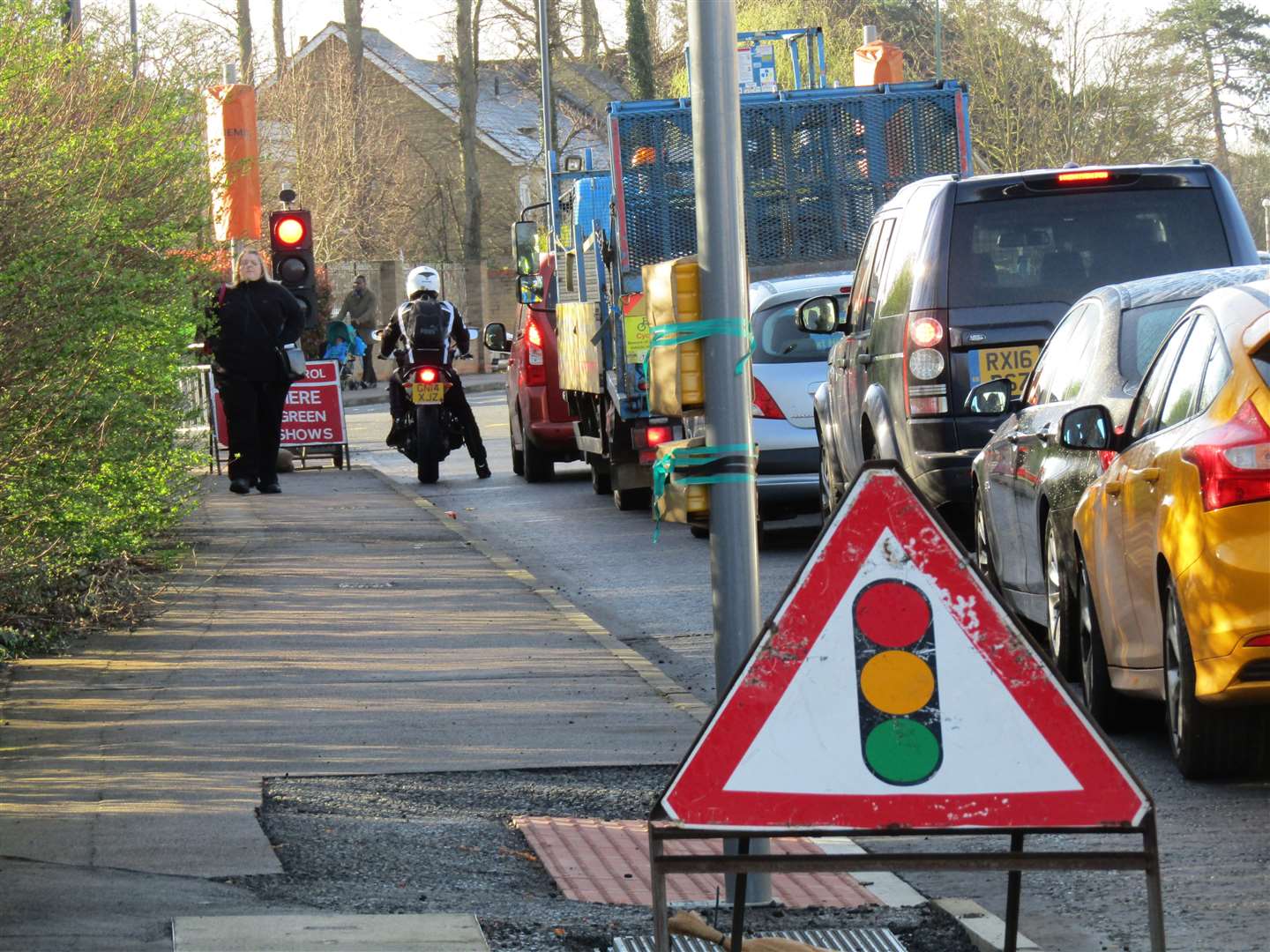 Traffic along Hermitage Lane while the latest homes are built.