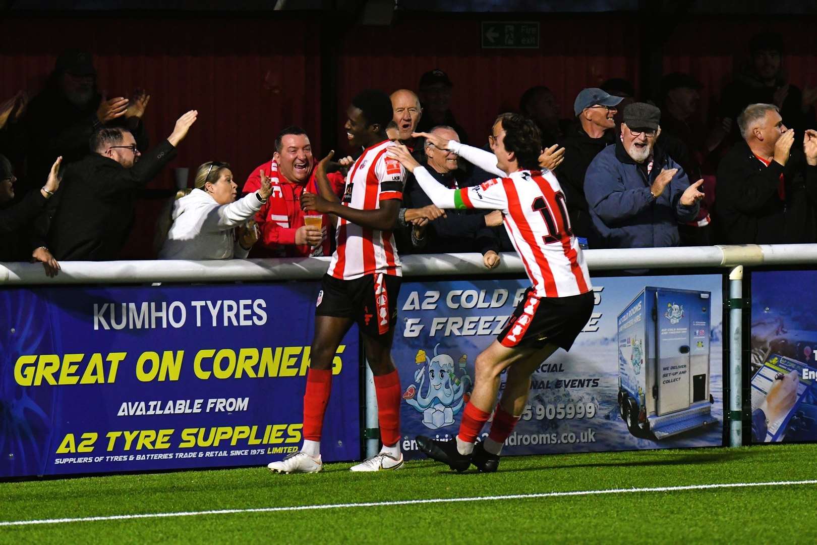 Billy Bennett congratulates Lekan Majoyegbe after he scores Sheppey's winner Picture: Marc Richards