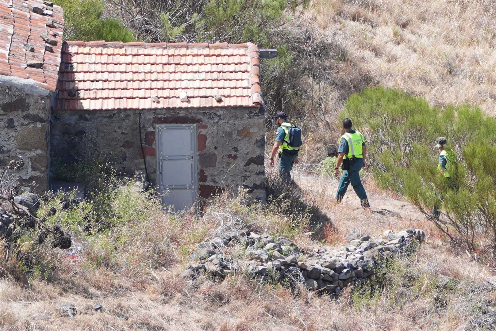 Members of a search and rescue team near the village of Masca in Tenerife, the last known location of British teenager Jay Slater (James Manning/PA)