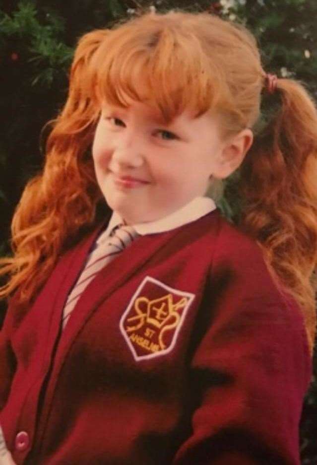 Caitlin grew a long fringe and wore make-up to stop her from being bullied. Photo: Caitlin Ounsworth