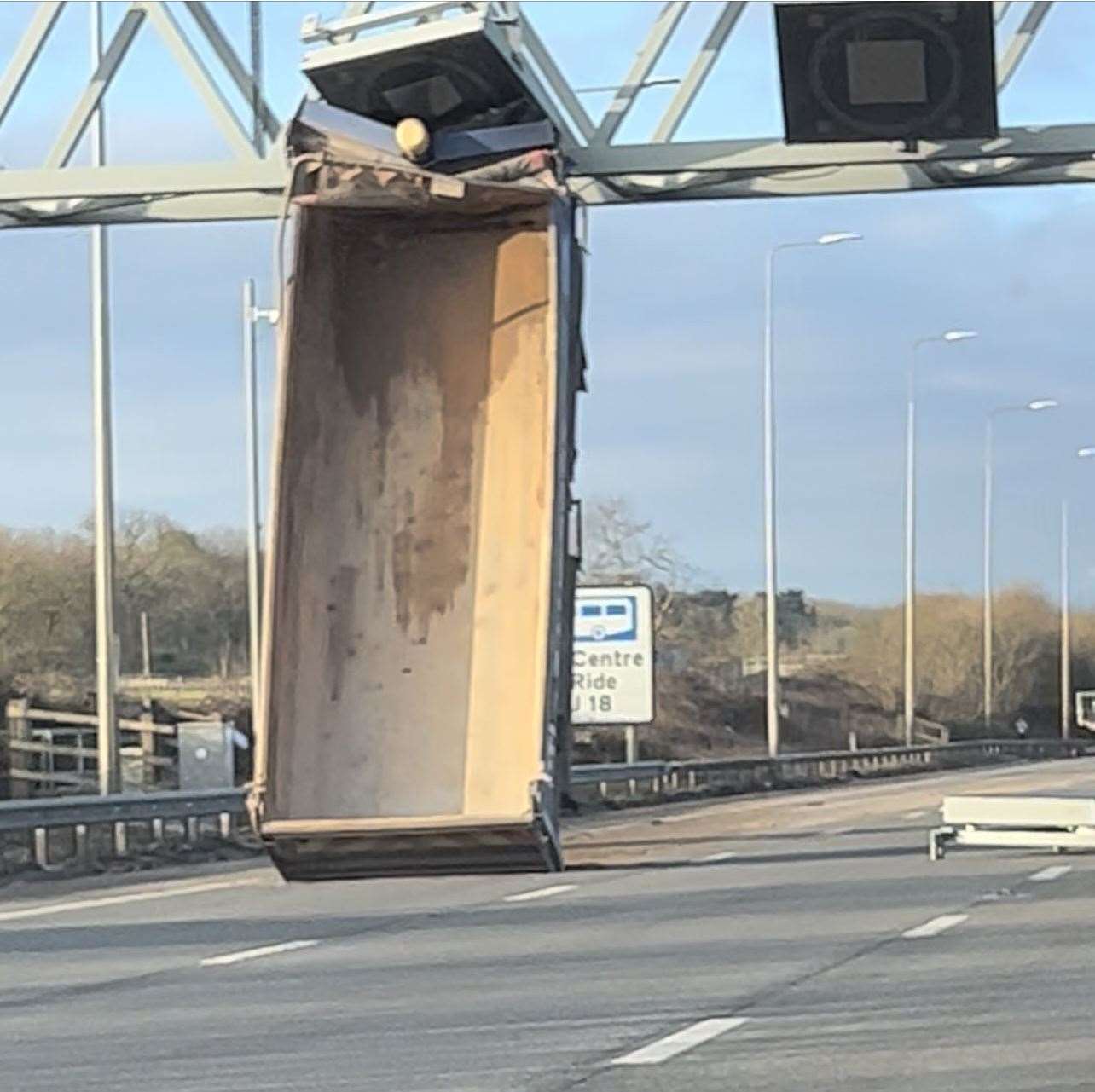 The vehicle was wedged under the gantry in lane one (Sam Greenslade/PA)