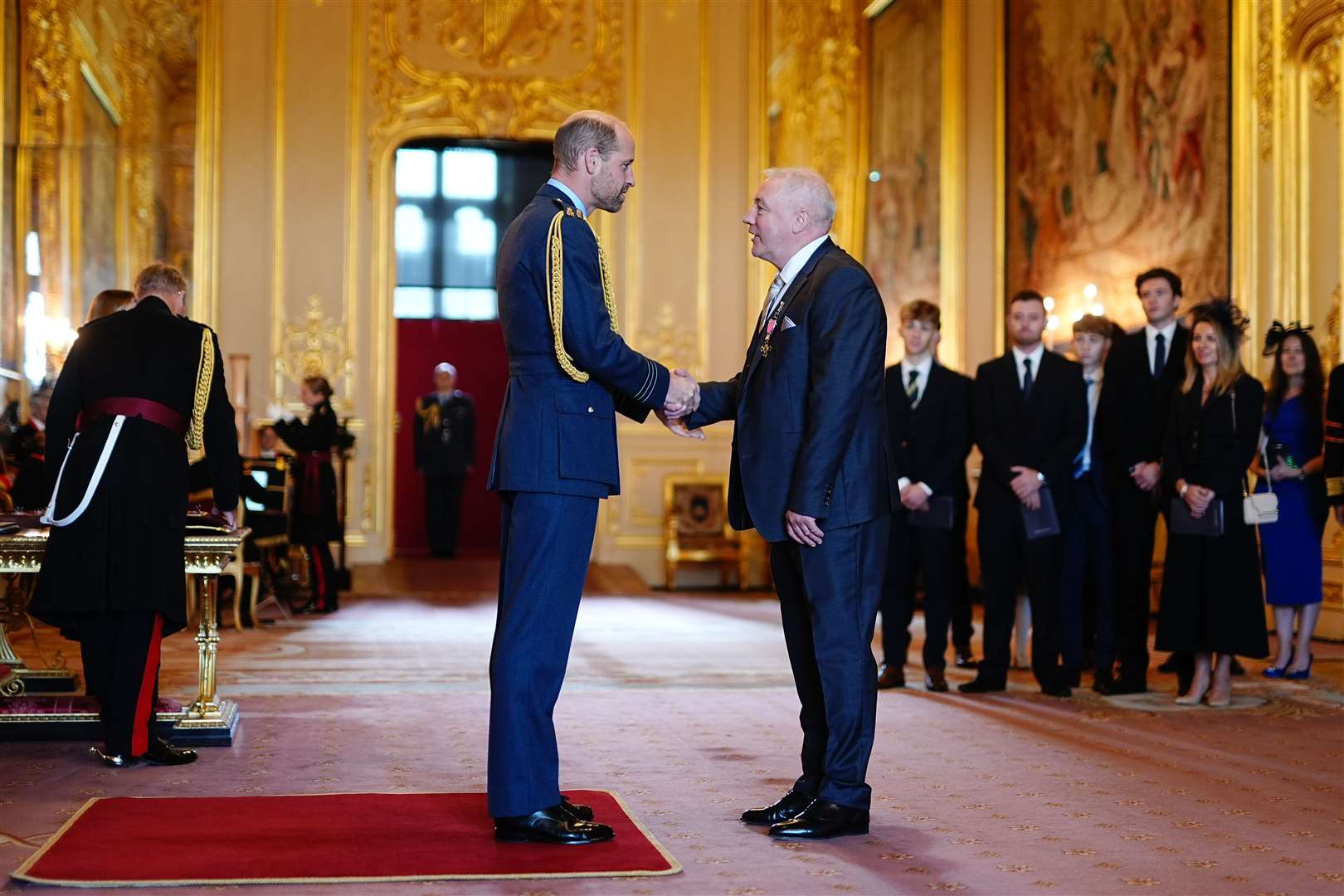 Ally McCoist received his OBE from the Prince of Wales during an investiture ceremony at Windsor Castle (Aaron Chown/PA)