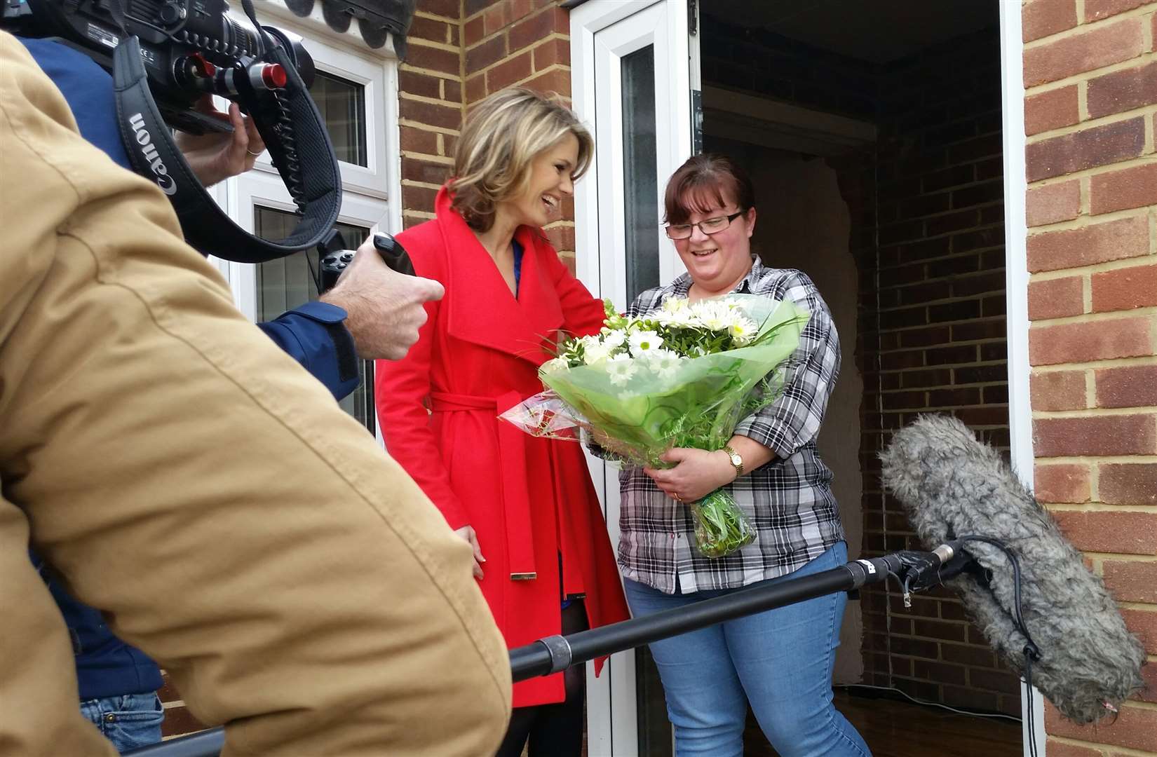 Good Morning presenter Charlotte Hawkins surprises ellenor carer Vicki Read.