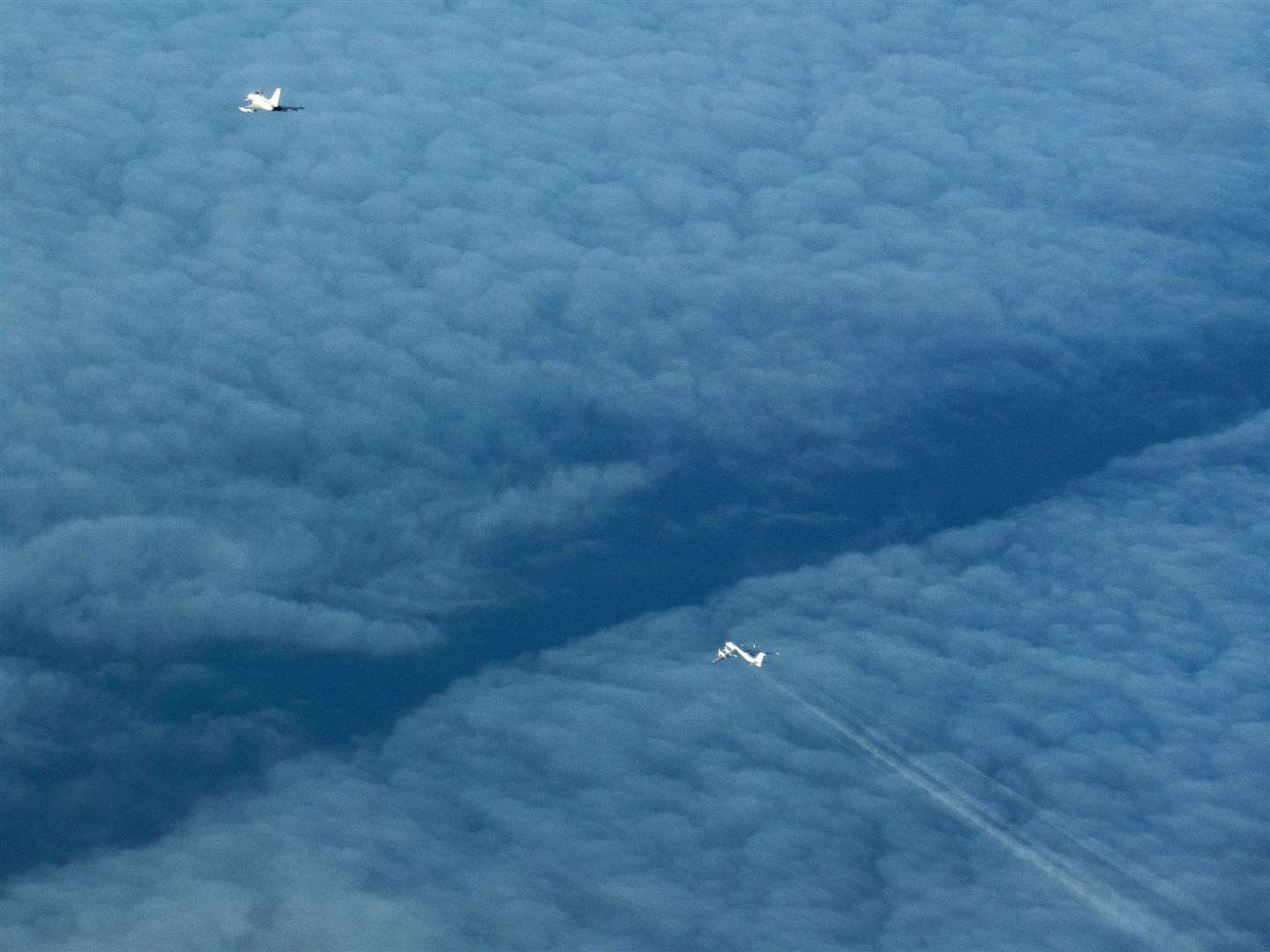 A Typhoon keeps tabs on the Russian planes travelling north of the Shetland Islands (MoD/Crown Copyright/PA)