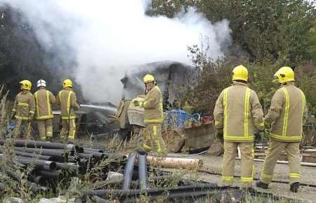 Firefighters bringing the blaze under control. Picture: ANDY PAYTON