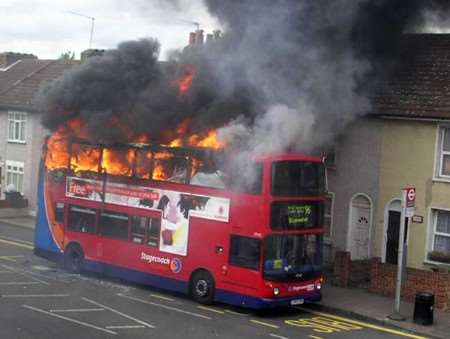 The bus at the height of the blaze. Picture: ASMA TARIQ