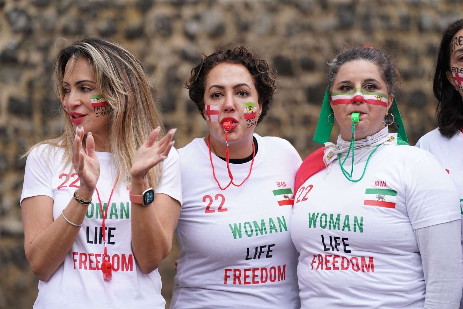 British-Iranian women protest in Westminster wearing t-shirts with the slogan “Woman, Life, Freedom” (Kirsty O’Connor/PA)