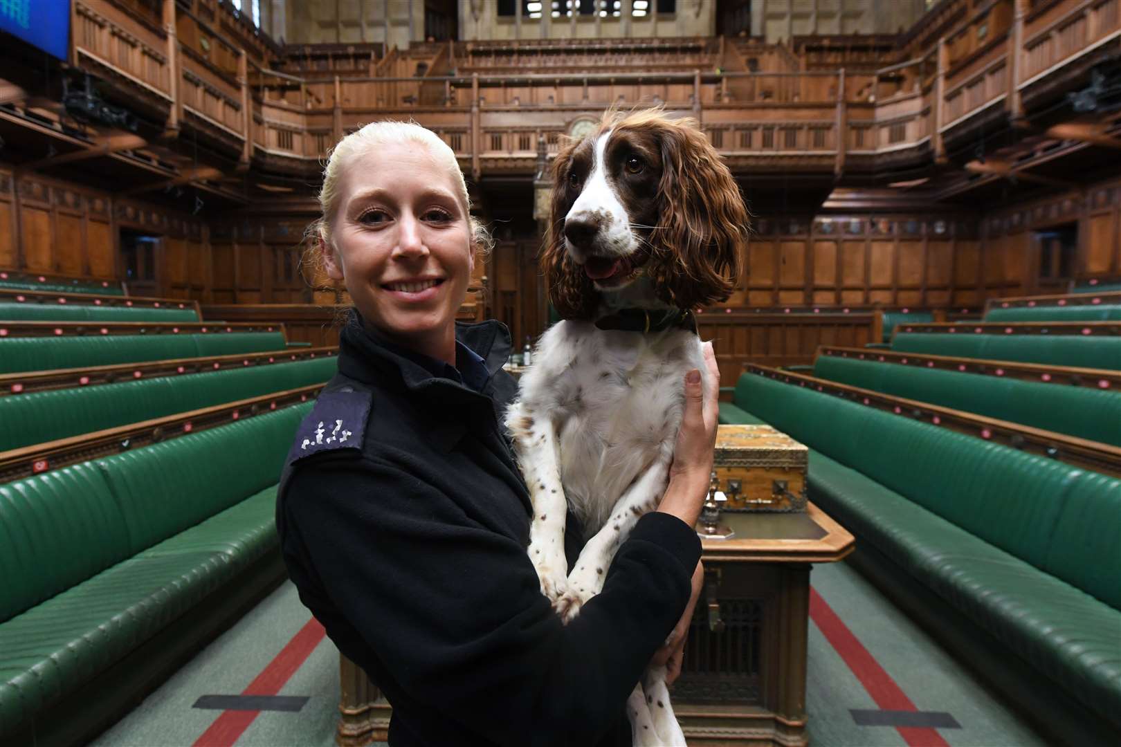 Poppy with Pc Spalding (Jessica Taylor/UK Parliament)