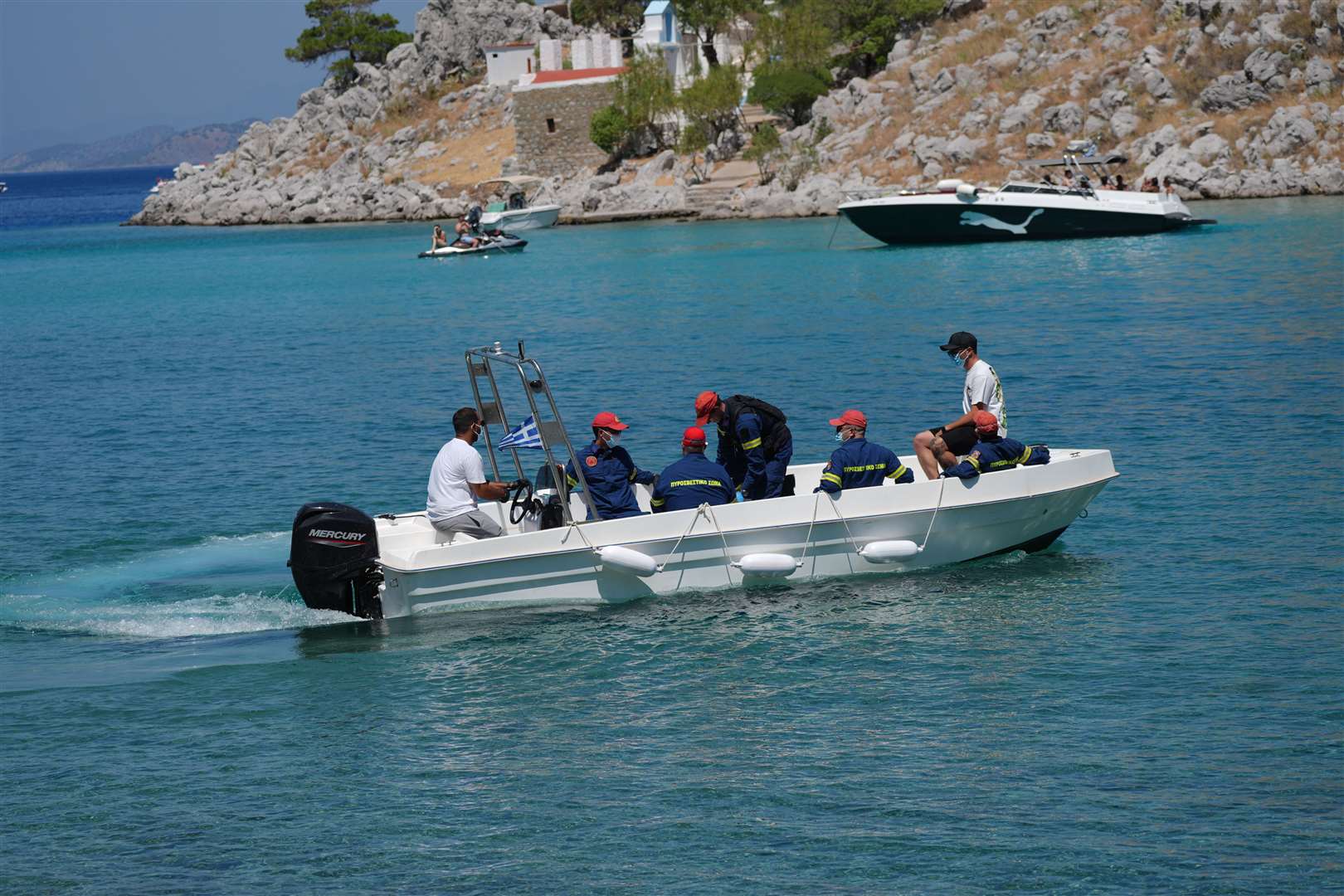 Emergency services leaving Agia Marina in Symi, Greece, where the body Michael Mosley was discovered (Yui Mok/PA)