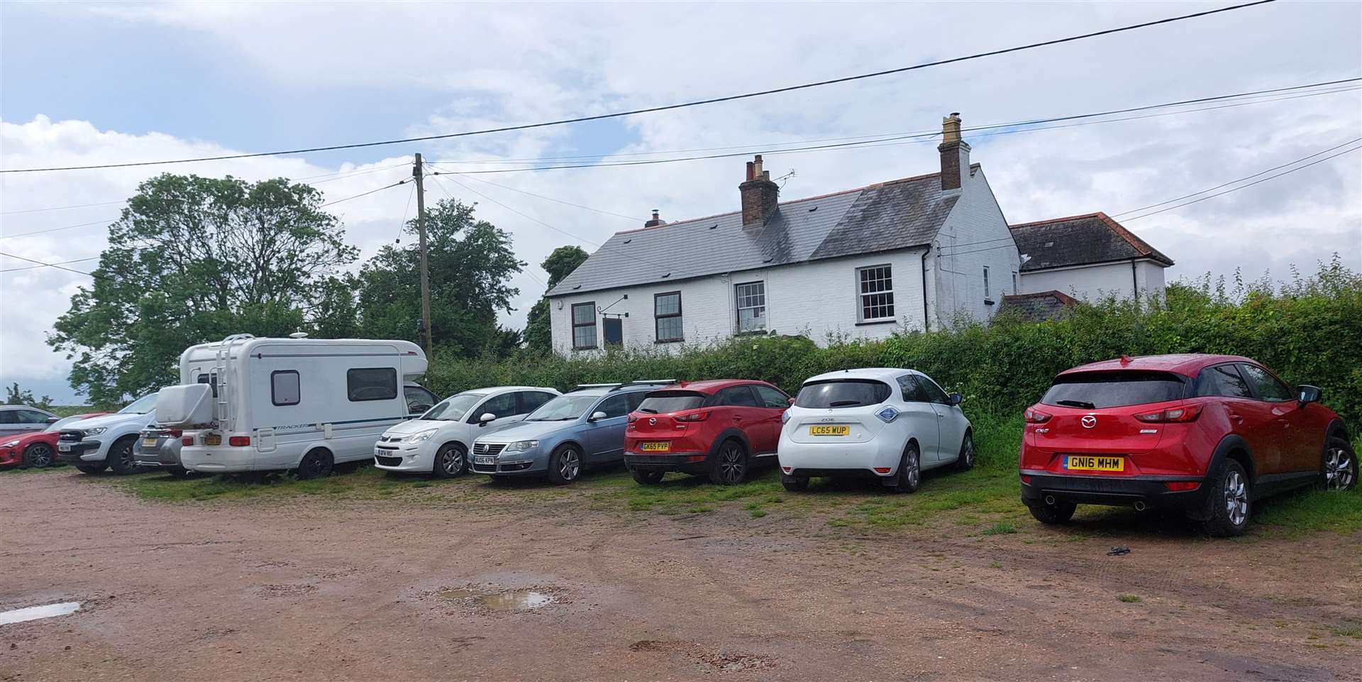 The car park in Ripple which the homes would be built on is used by residents and pub customers