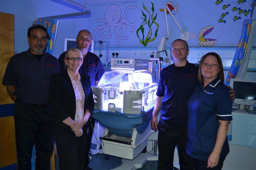 Dartford firefighter Sonny Mangat, Senior Sister and Midwife Sarah Blanchard with firefighter Gary Abrahams, firefighter Tim Wilmot and Sister Michelle Wright