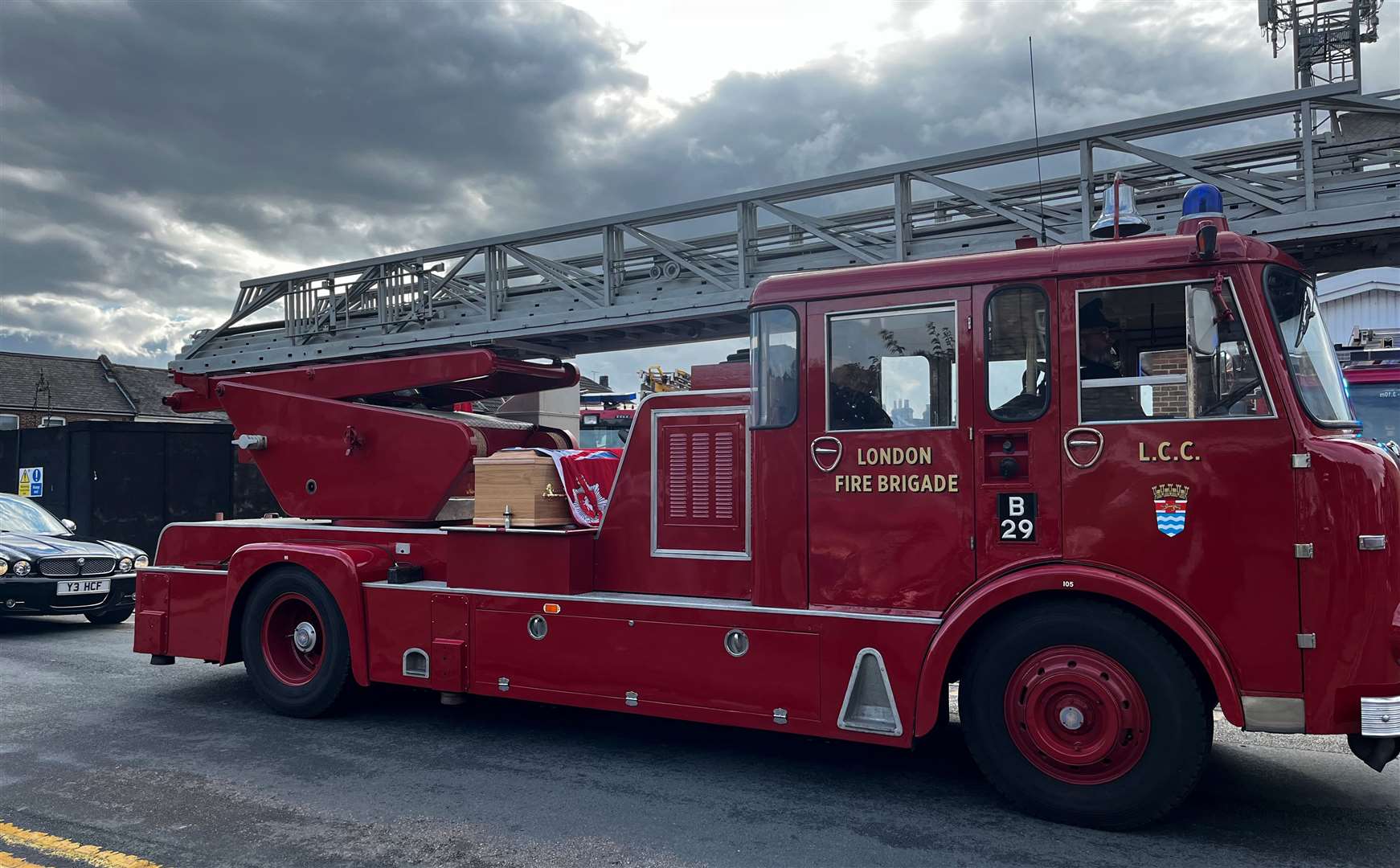 Cllr Peter Harman's coffin was mounted on a ceremonial firetruck