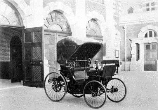 A photo of one of David Salomon's early motor cars in the courtyard of the stableblock