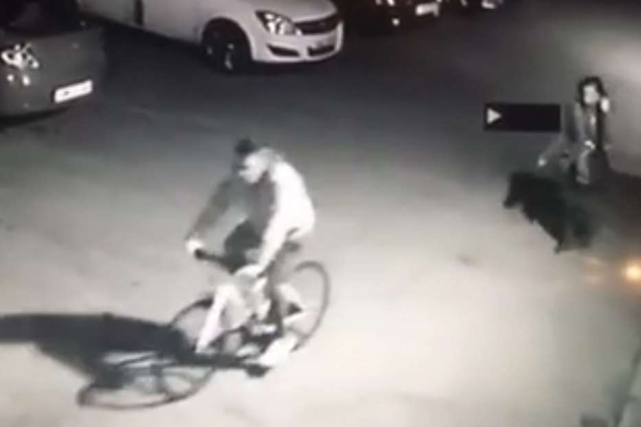 The CCTV shows a man riding off on a bike