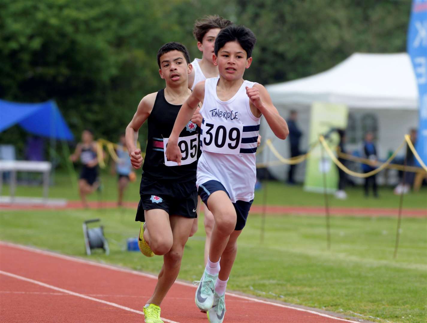 No.309 Charlie Warren of Tonbridge hits his stride in the under-15 boys’ 1,500m. Picture: Barry Goodwin