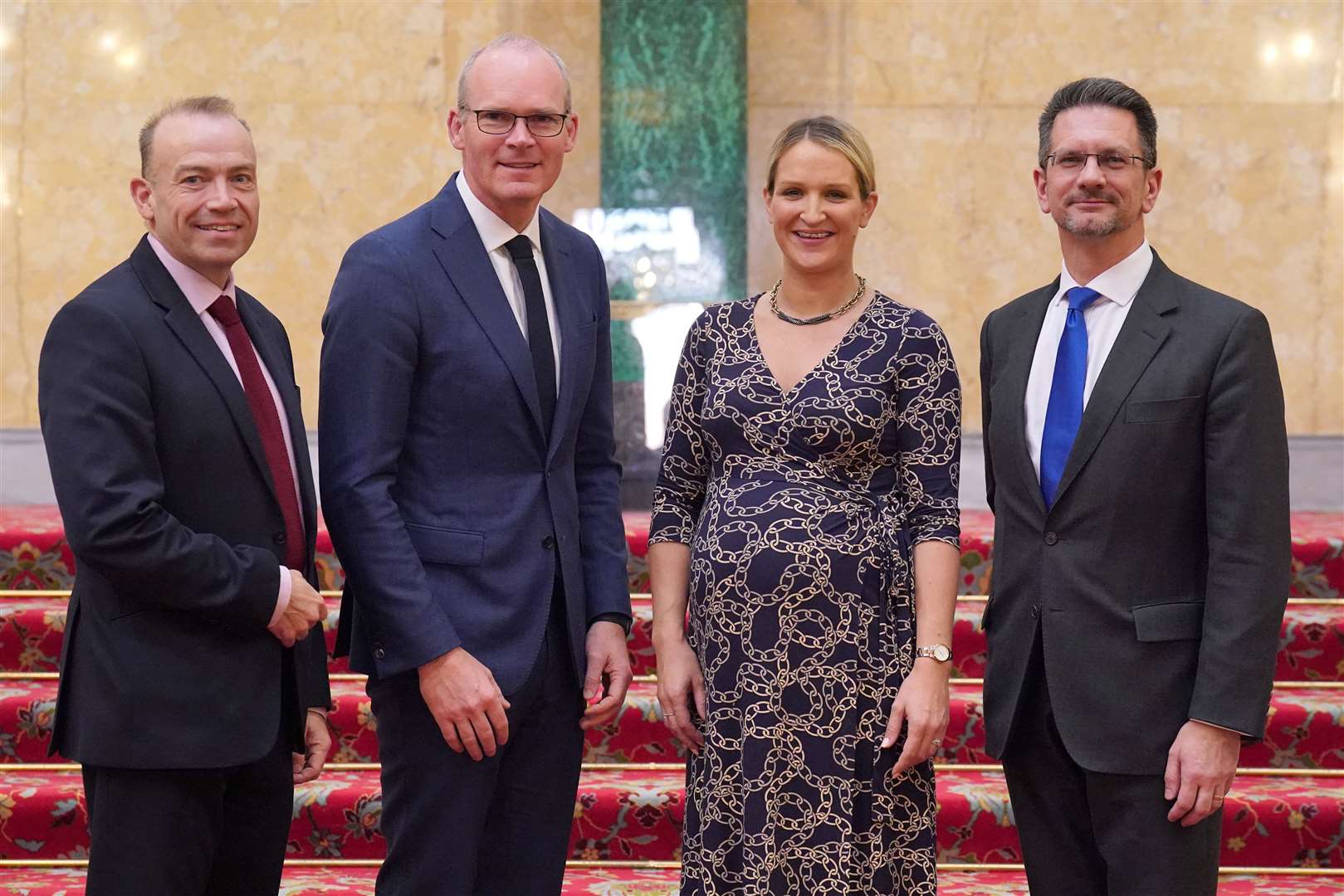 Chris Heaton Harris and Simon Coveney with Irish justice minister Helen McEntee and the UK’s Northern Ireland minister Steve Baker (Jonathan Brady/PA)