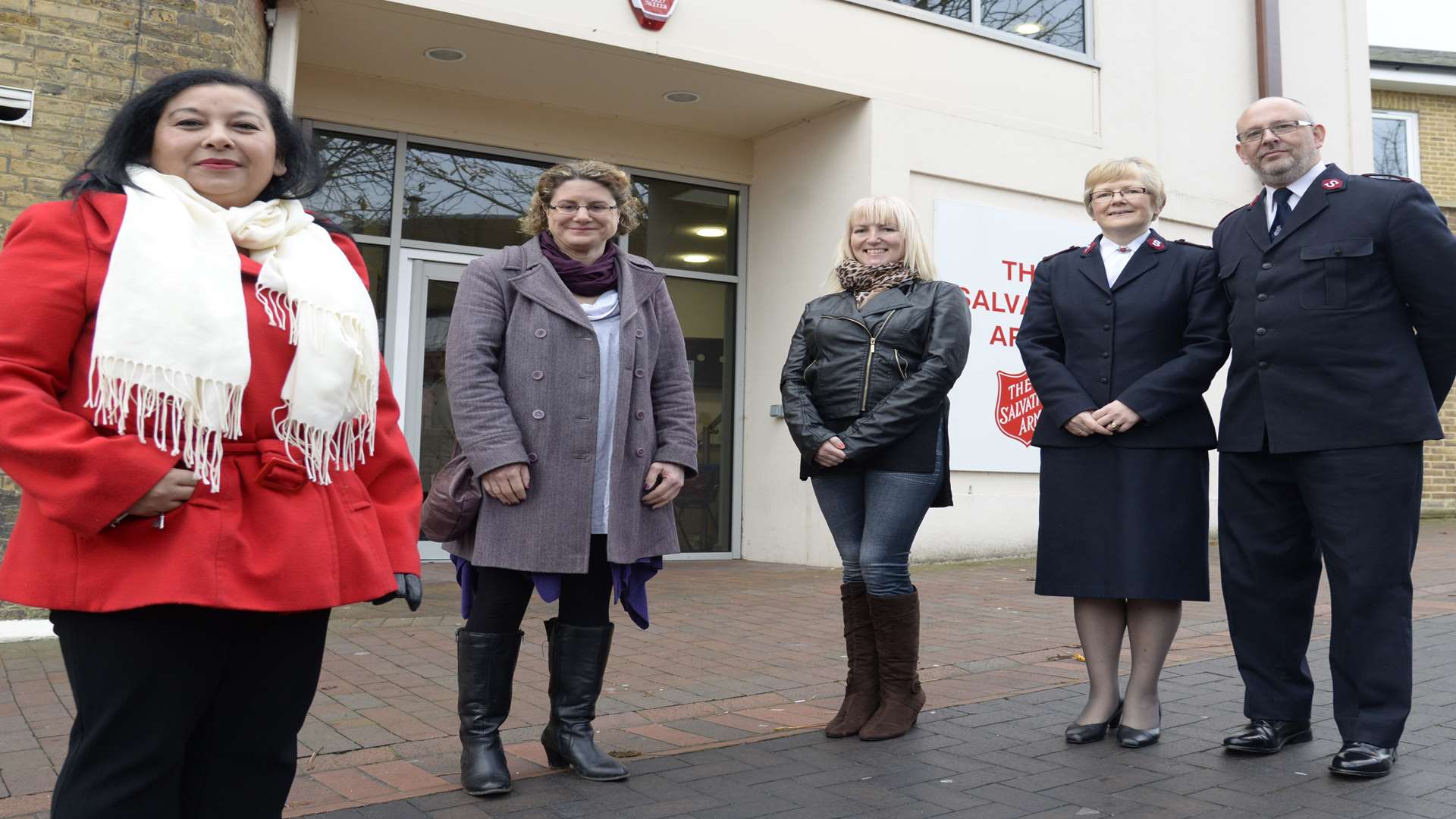 Grace Kelly and two of her fellow volunteers Liz Almond and Jo Coller who are holding a Christmas day dinner for people with nowhere to go on the day at the Salvation Army Citadel in Church Street, Chatham. With them are Majors Andrea and Alec Still.