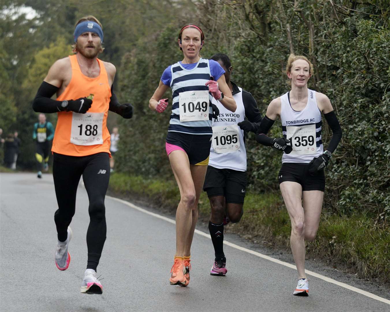 No.1049 Hannah Roberts of Dartford Harriers and No.359 Aimee Donohue of Ashford Striders. Picture: Barry Goodwin (62013879)