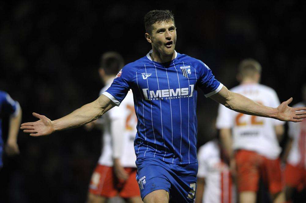 Former Gills loanee John Mousinho celebrates scoring the winner in the 3-2 victory over Stevenage in November. Picture: Barry Goodwin