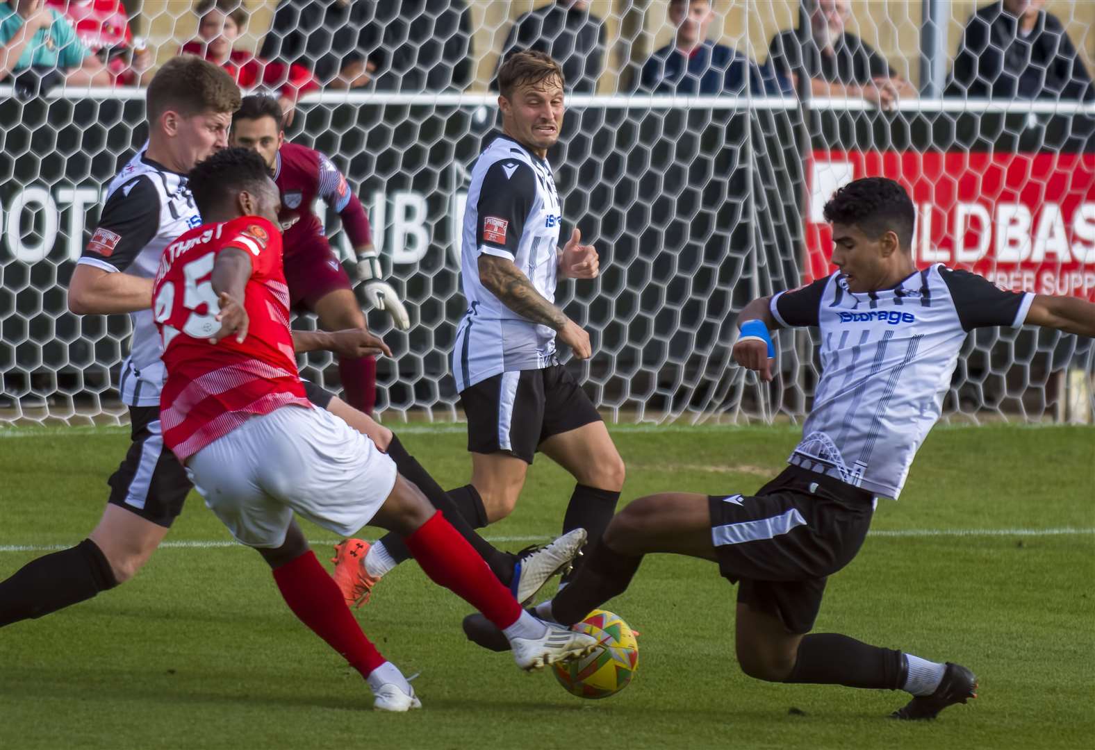 Ebbsfleet's Shaq Coulthirst in the thick of the action at Hanwell Town. Picture: Ed Miller/EUFC