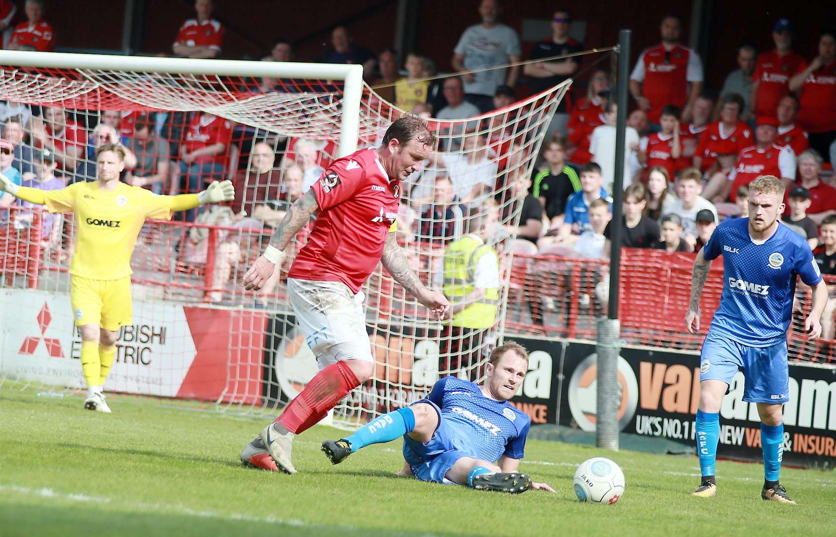 Danny Kedwell tries to get away from Stuart Lewis in the penalty area Picture: Phil Lee