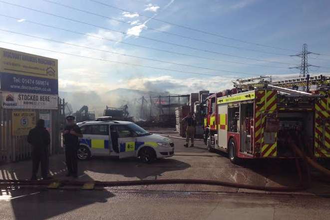 Fire crews outside Discount Builders Merchants in Northfleet. Picture: Thom Morris