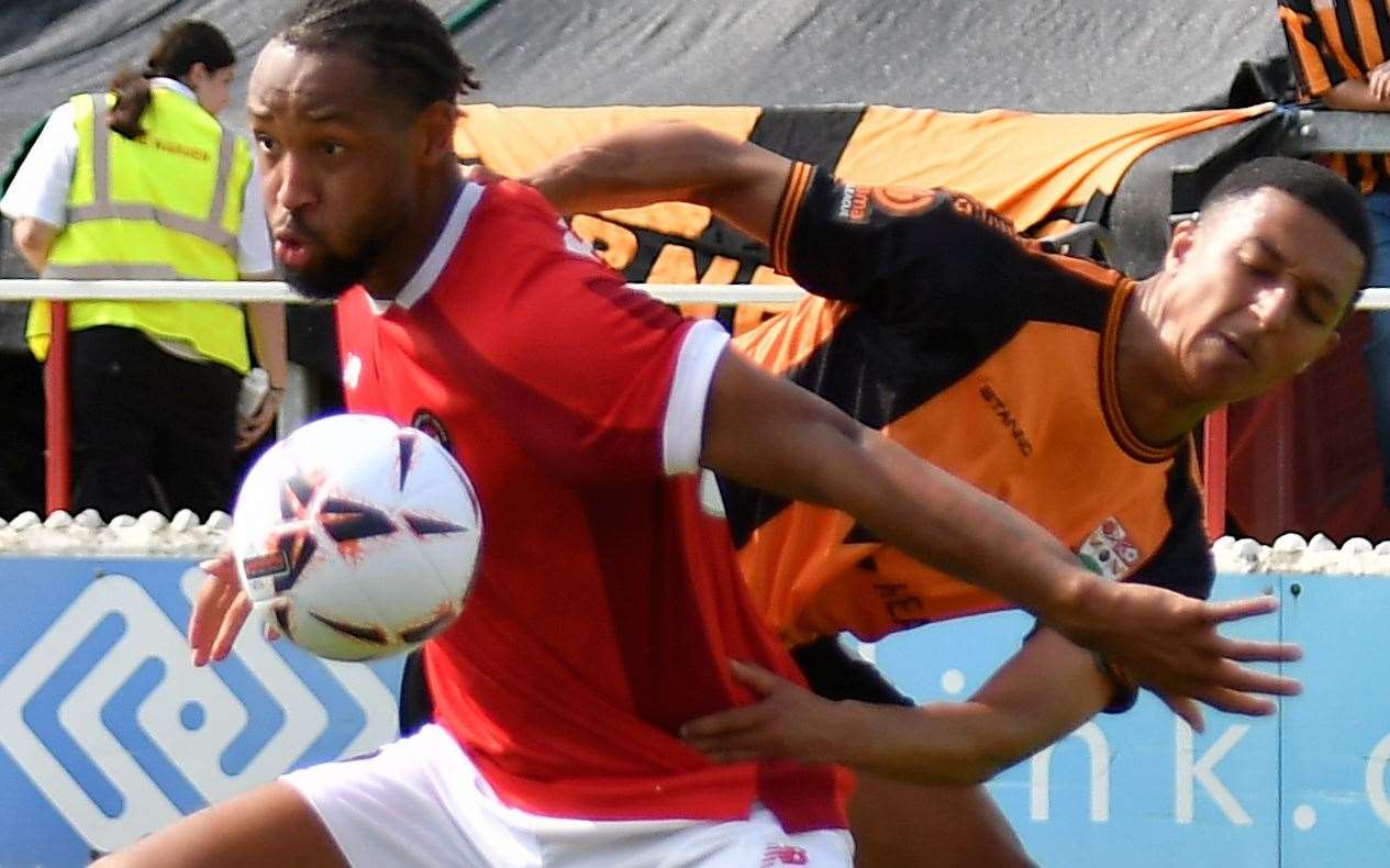 Ebbsfleet striker Kwame Thomas up against ex-Fleet defender Myles Kenlock, now of Barnet. Picture: Ed Miller/EUFC