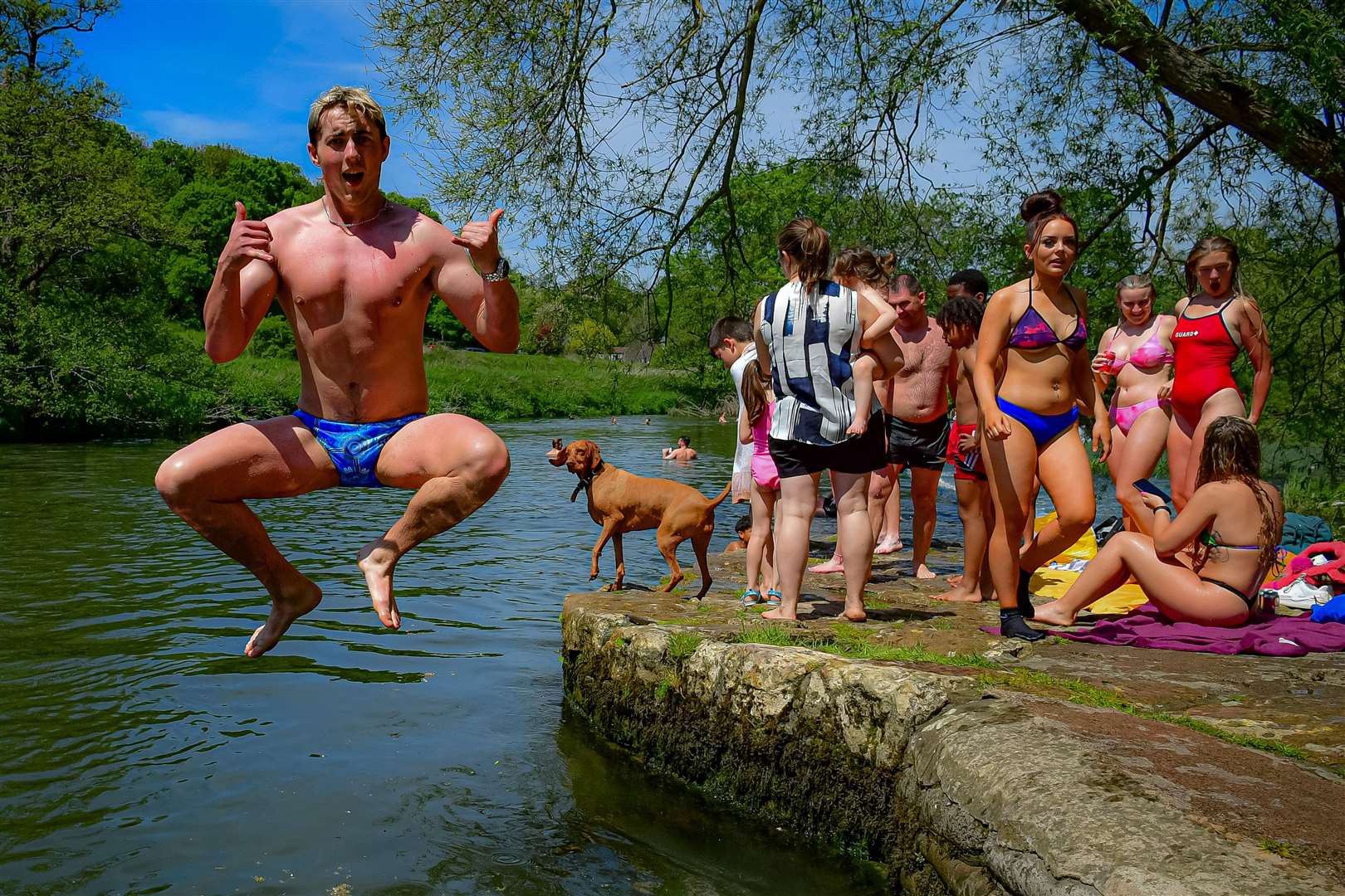 Taking the plunge at Warleigh Weir, Bath (Ben Birchall/PA)