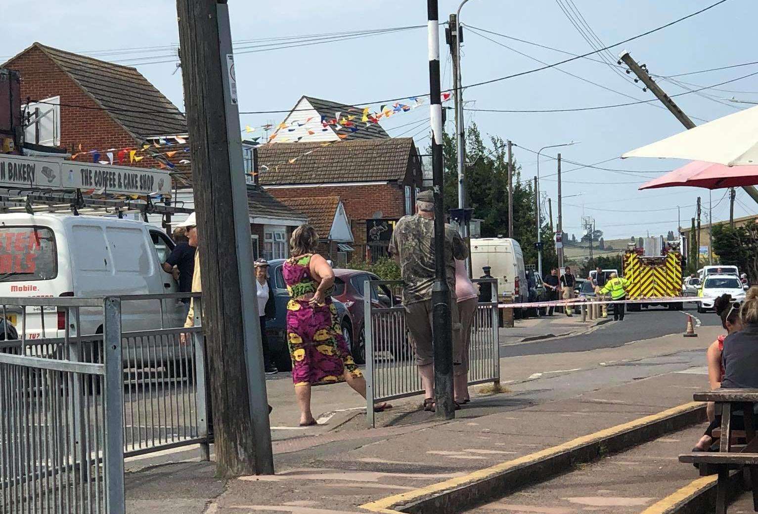 The fallen telegraph pole in Leysdown Road on the Isle of Sheppey can be seen on the right of the image