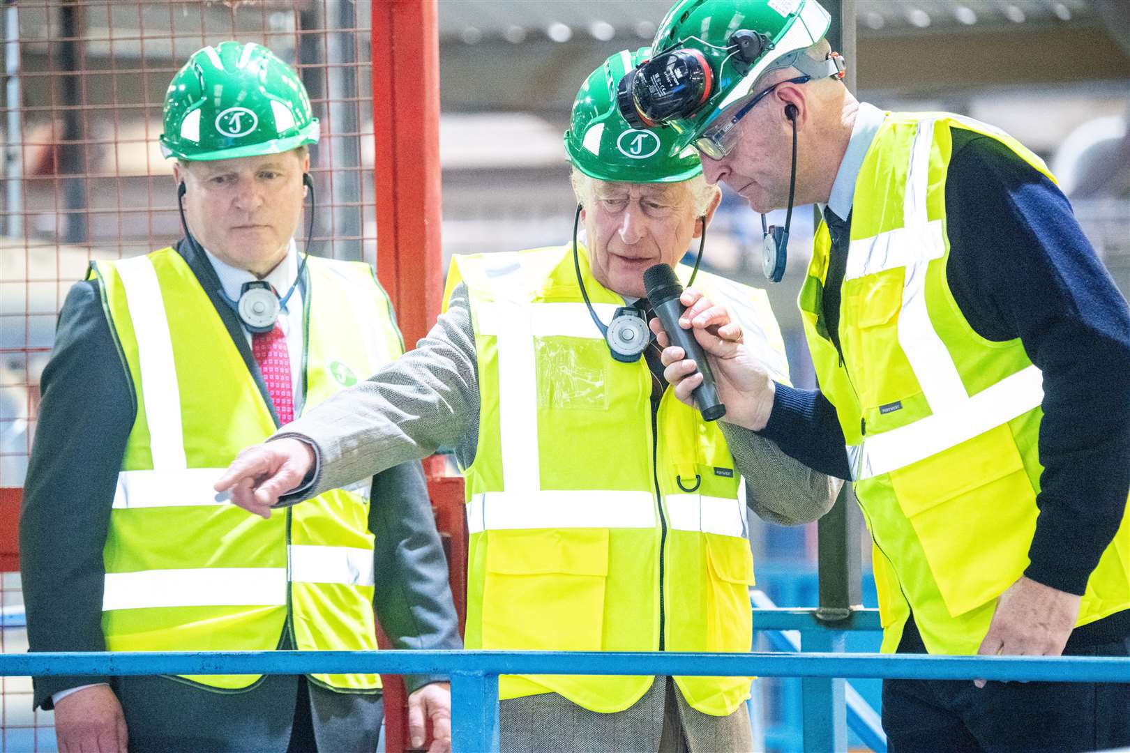 The King talking with site manager Duncan Cassie during a visit to the James Jones and Sons sawmill (Kami Thomson/DC Thomson/PA)