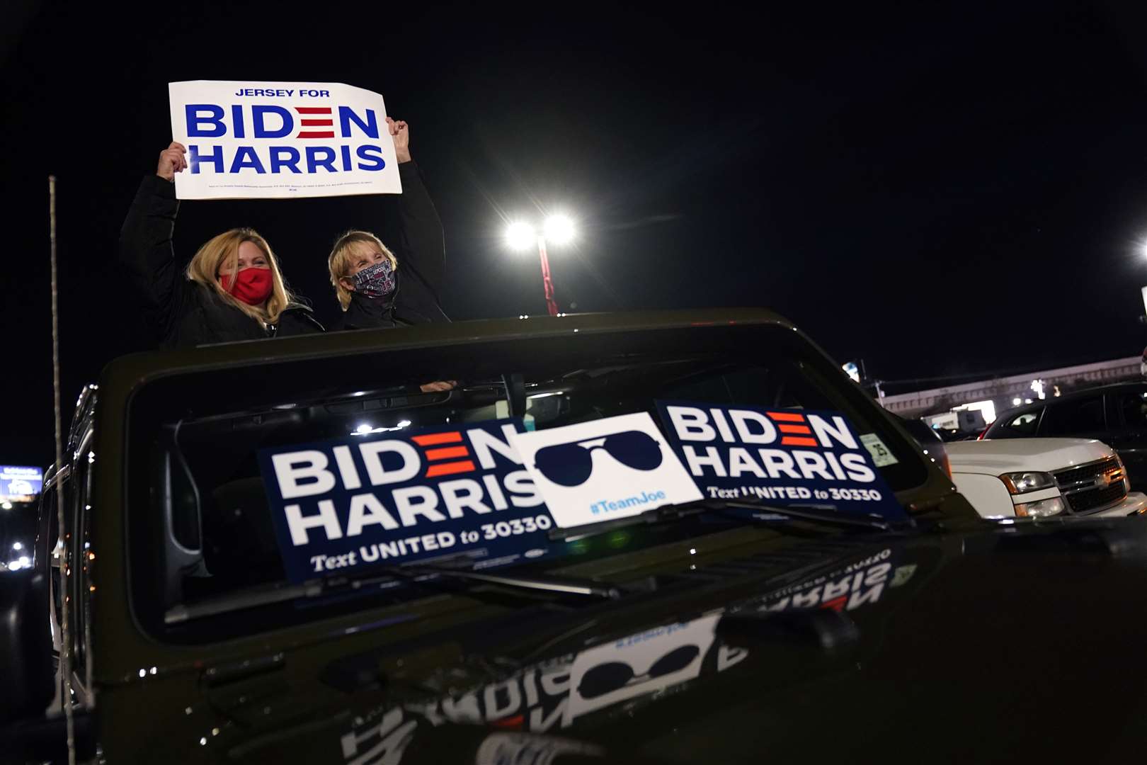 People arrive for an election night rally for Democratic presidential candidate former vice president Joe Biden (Andrew Harnik/AP)