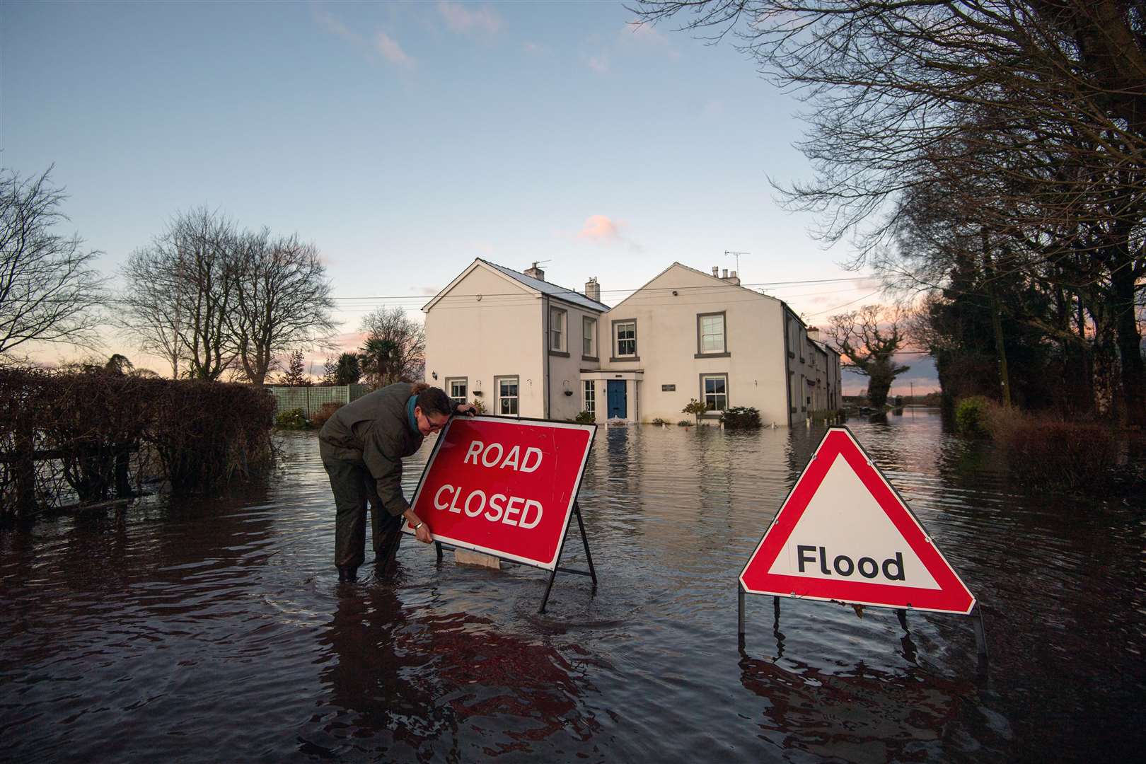 The streets of Lymm in Cheshire were flooded after overnight heavy rain (Joe Giddens/PA)