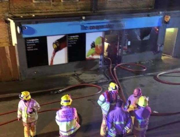 Firefighters outside the Co-op building in Upchurch. Picture: Nick Thompson-Moore (9374998)