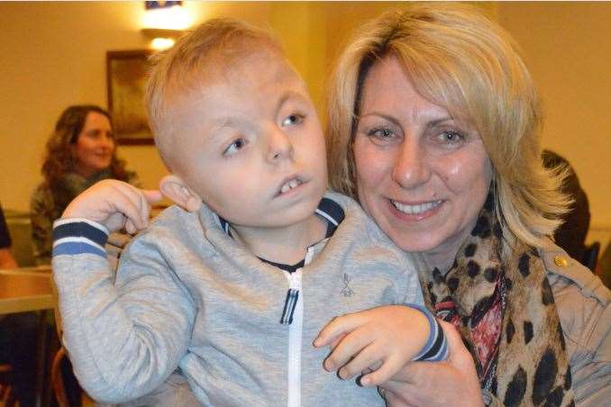 Sara Llewellyn, who set up Louie's Helping Hands, with son Louie