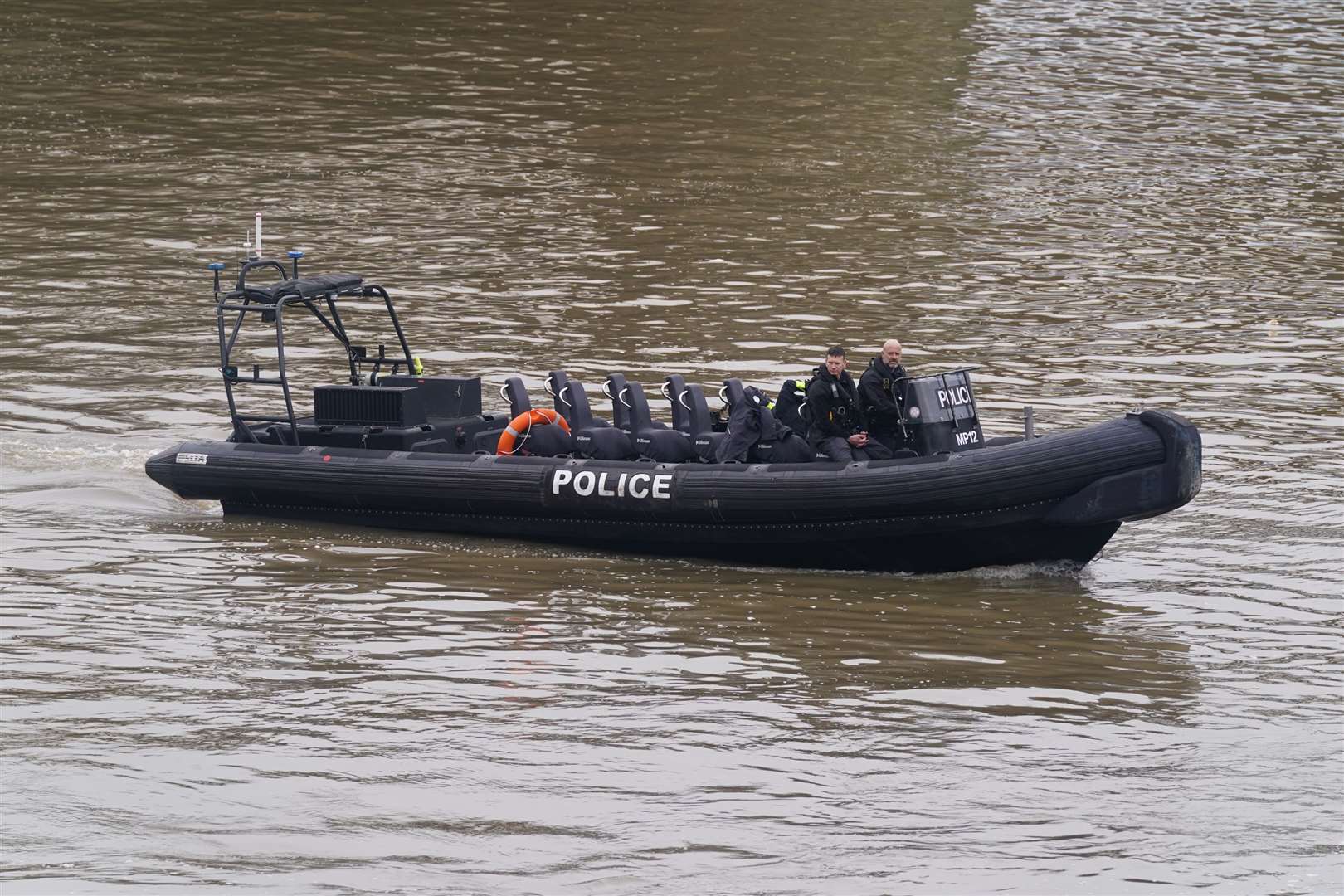 Members of the Metropolitan Police Marine Policing Unit searched for the body (Lucy North/PA) 