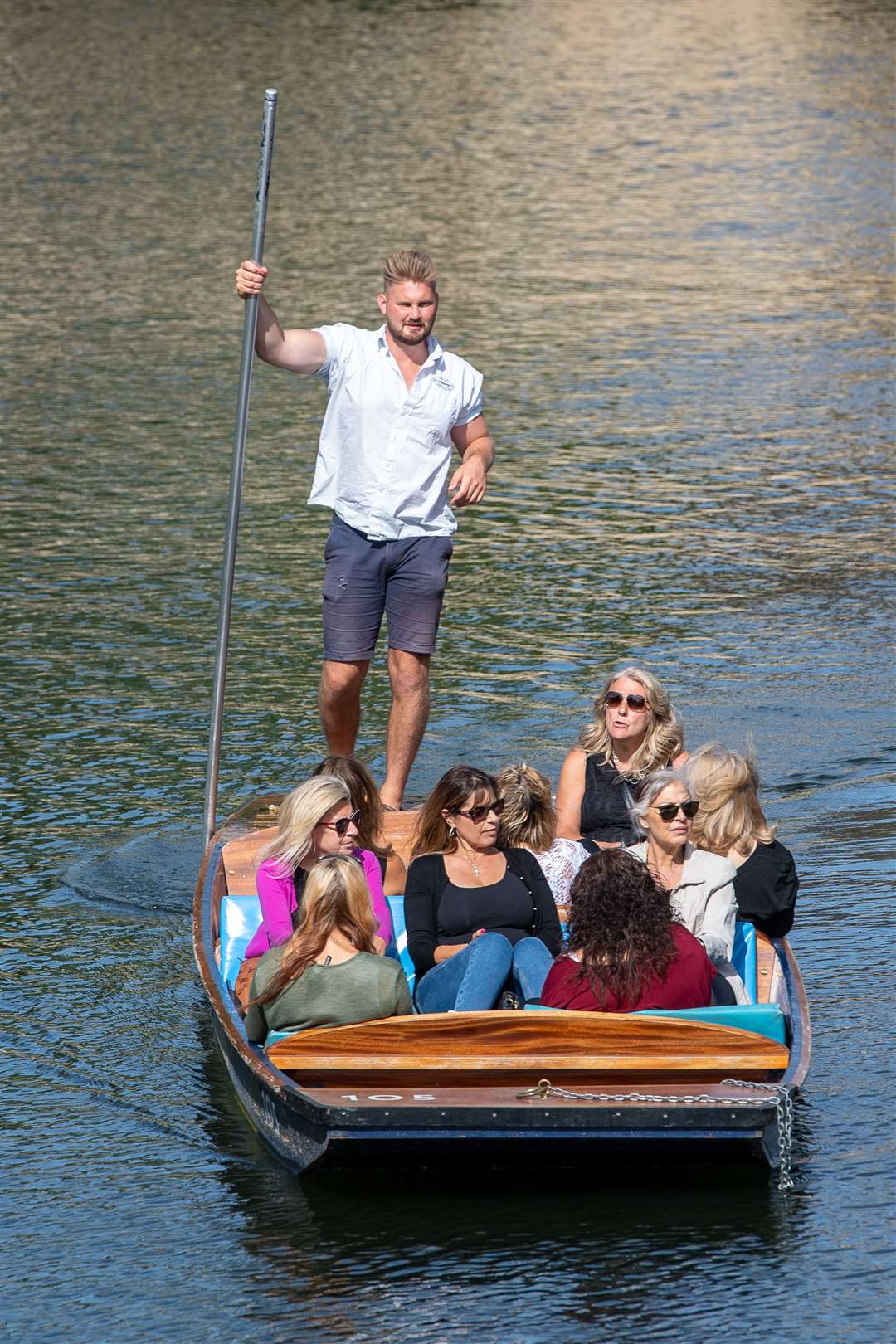 People enjoy a punt trip along the River Cam in Cambridge (Joe Giddens/PA)