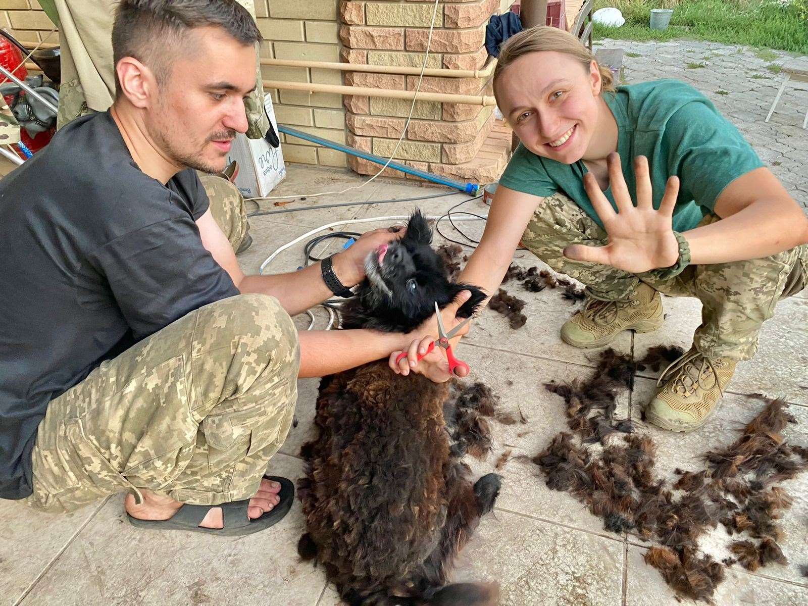 Oksana Krasnova and her husband, Stanislav, have rescued almost 30 pets from abandoned villages (Oksana Krasnova/PA)